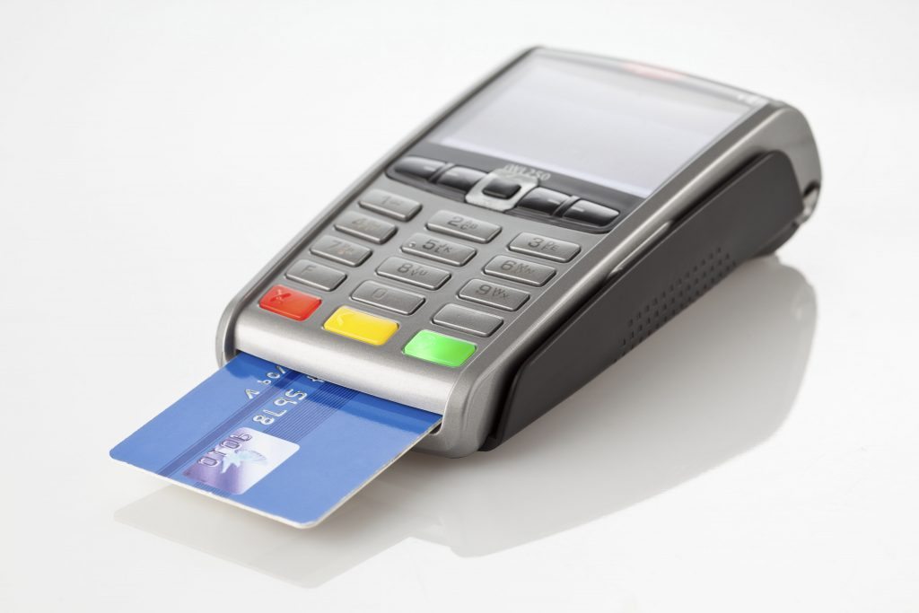 Chip and PIN - credit card terminal with credit card sticking out