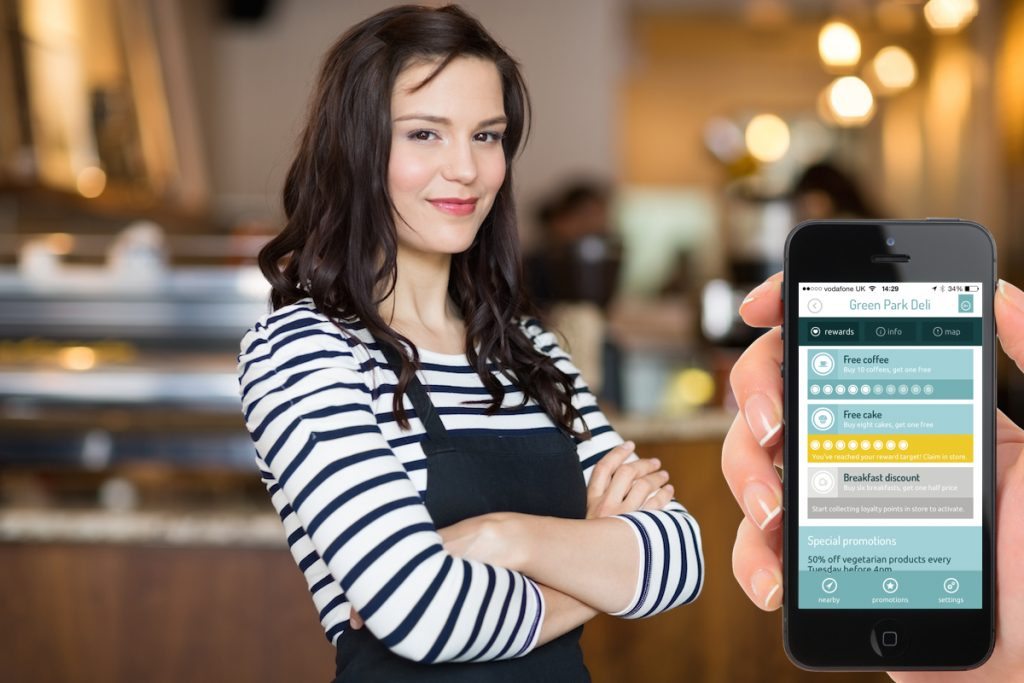 Loyalty Card App - woman standing confidently with a digital punch card program