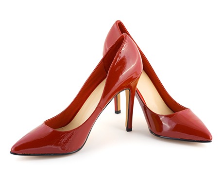 Pair of red high heel shoes against a white background - boutique shop POS system